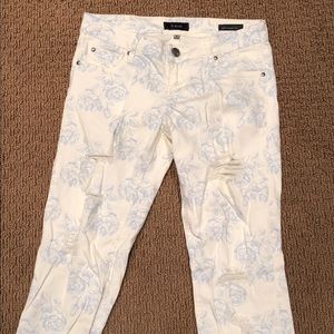 Distressed floral jeans